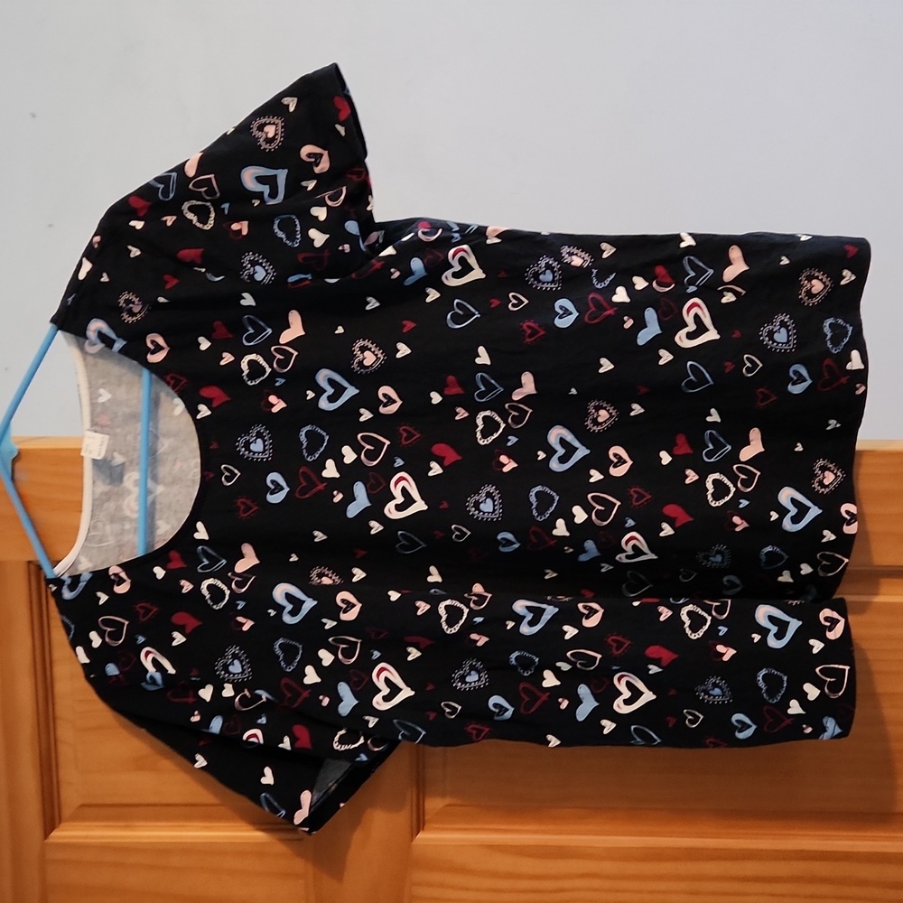 Navy blue heart covered top in size 12.